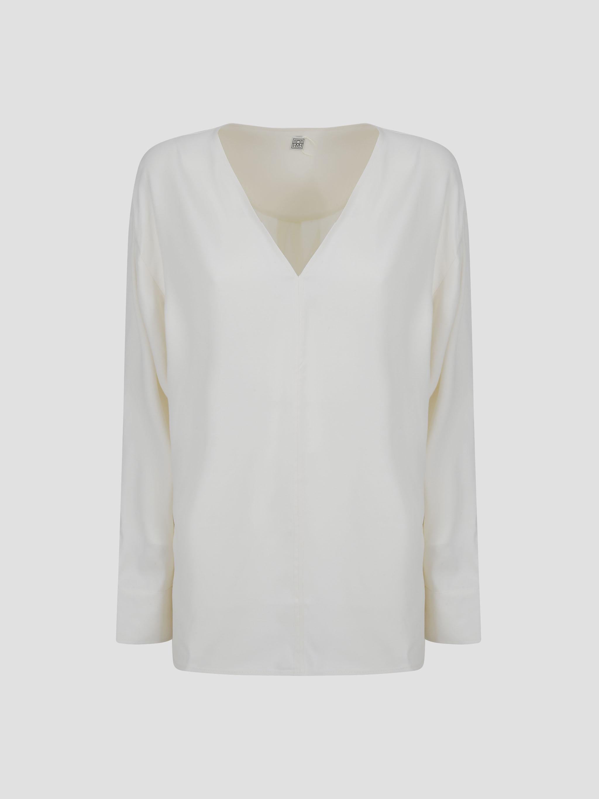 Bluza iz kepra z V-izrezom